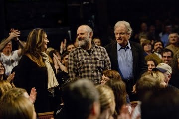 the founders of Rounder Records in a crowd