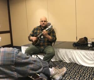Frank Sullivan with a mandolin, holds a workshop at Joe Val Festival